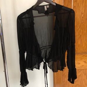 Black sheer top with bell sleeves and waist tie